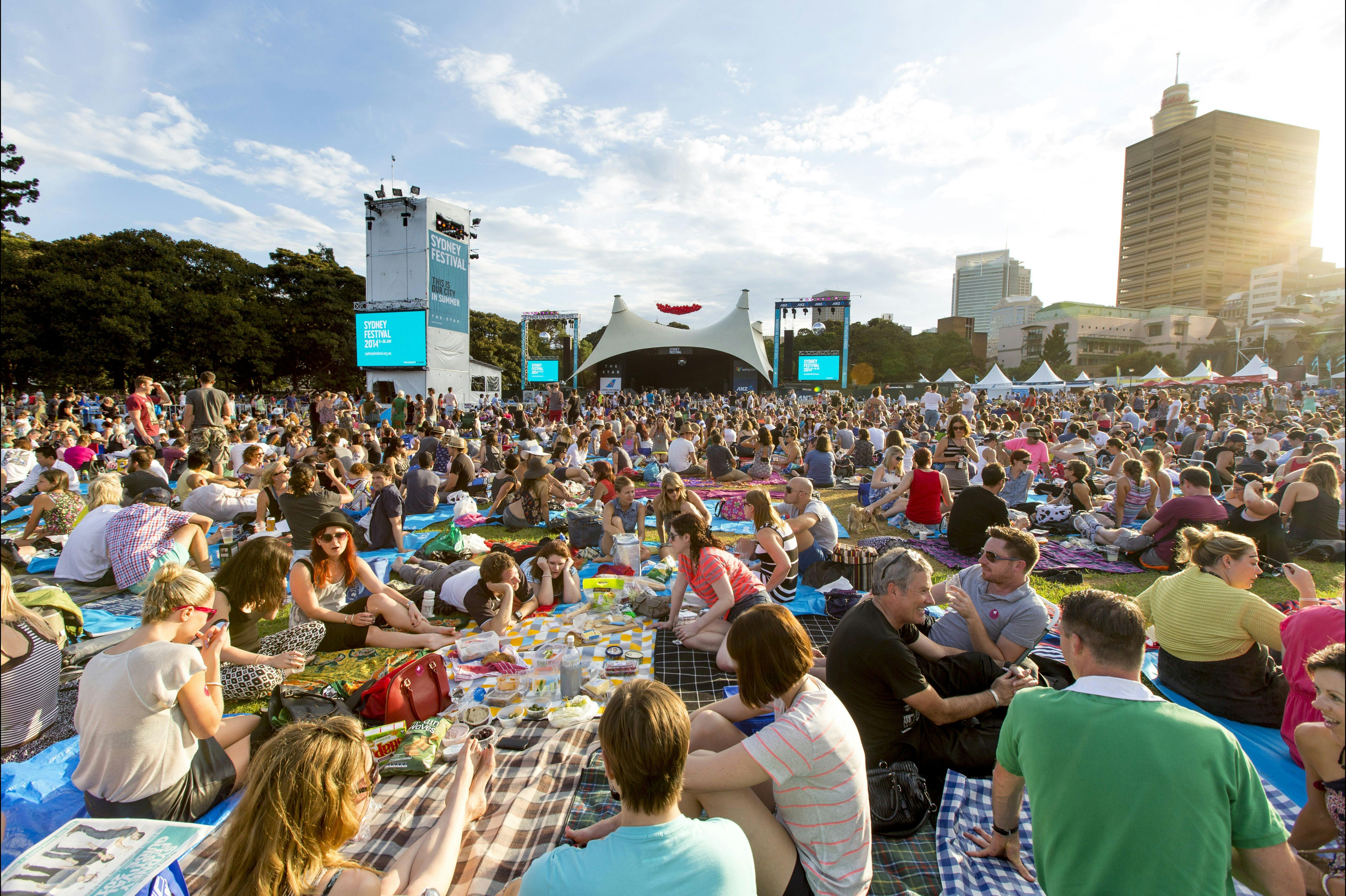 Crowds enjoying a concert at the Domain
