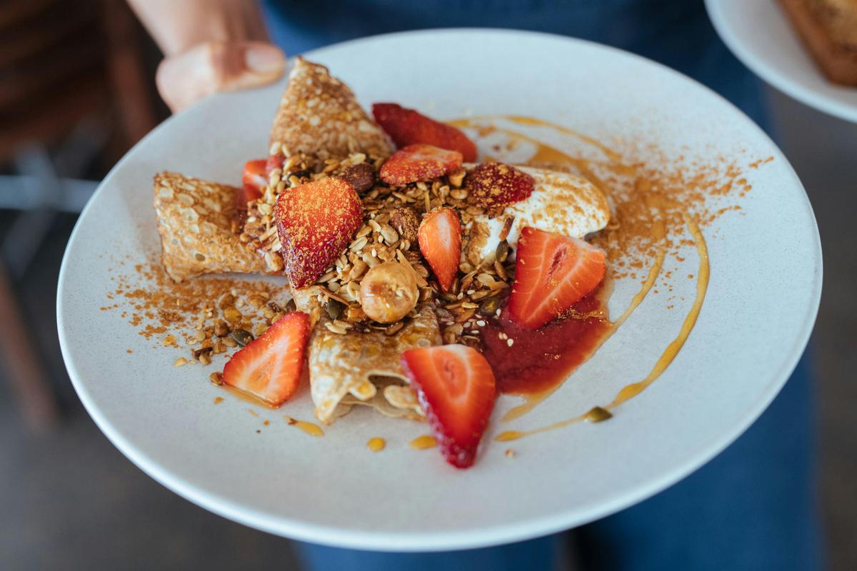 Cultured Buckwheat Crepes, sweet ricotta, seasonal fruit, house granola, maple