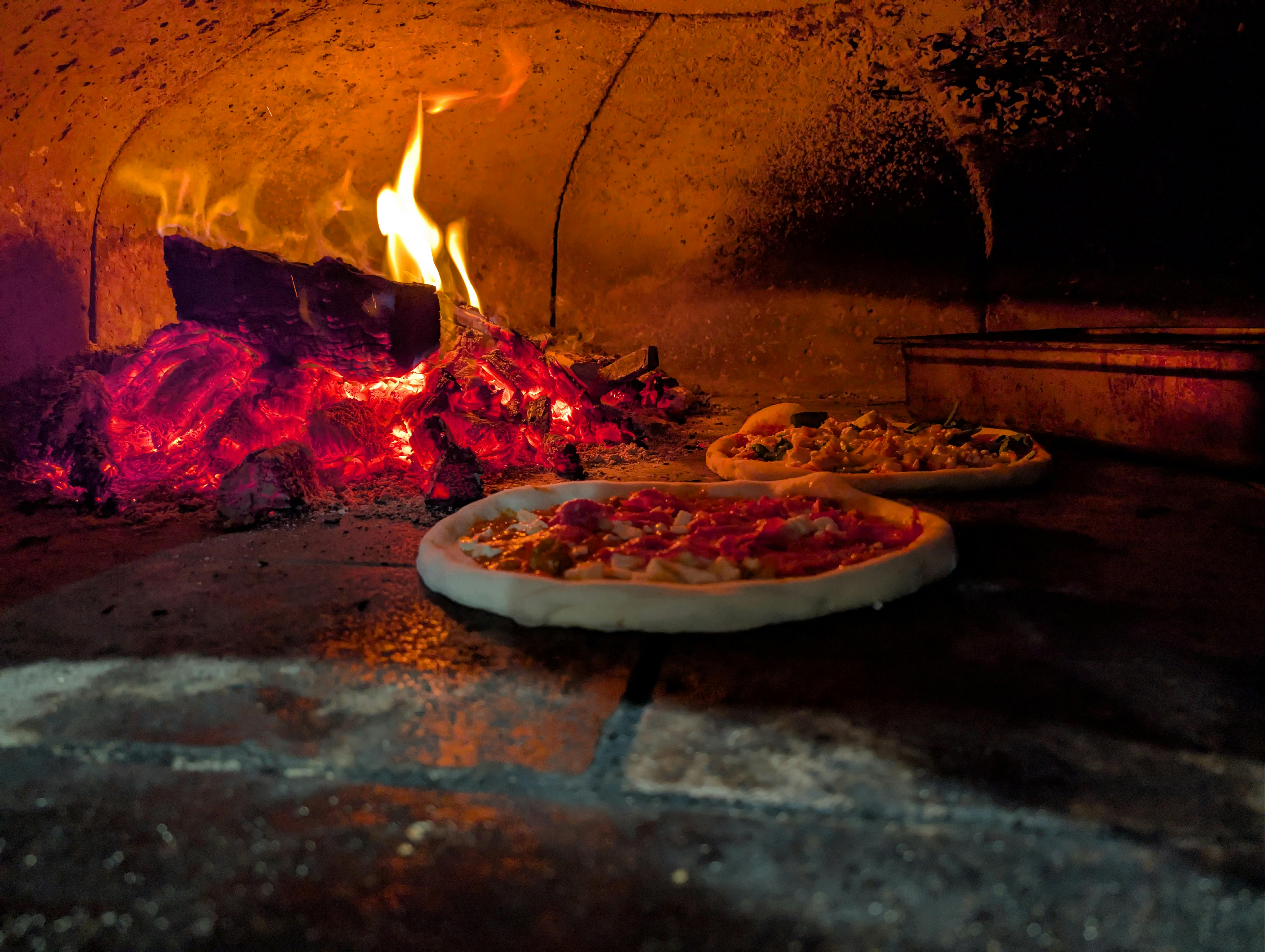 A diverse range of Pizza's straight from a woodfired oven.