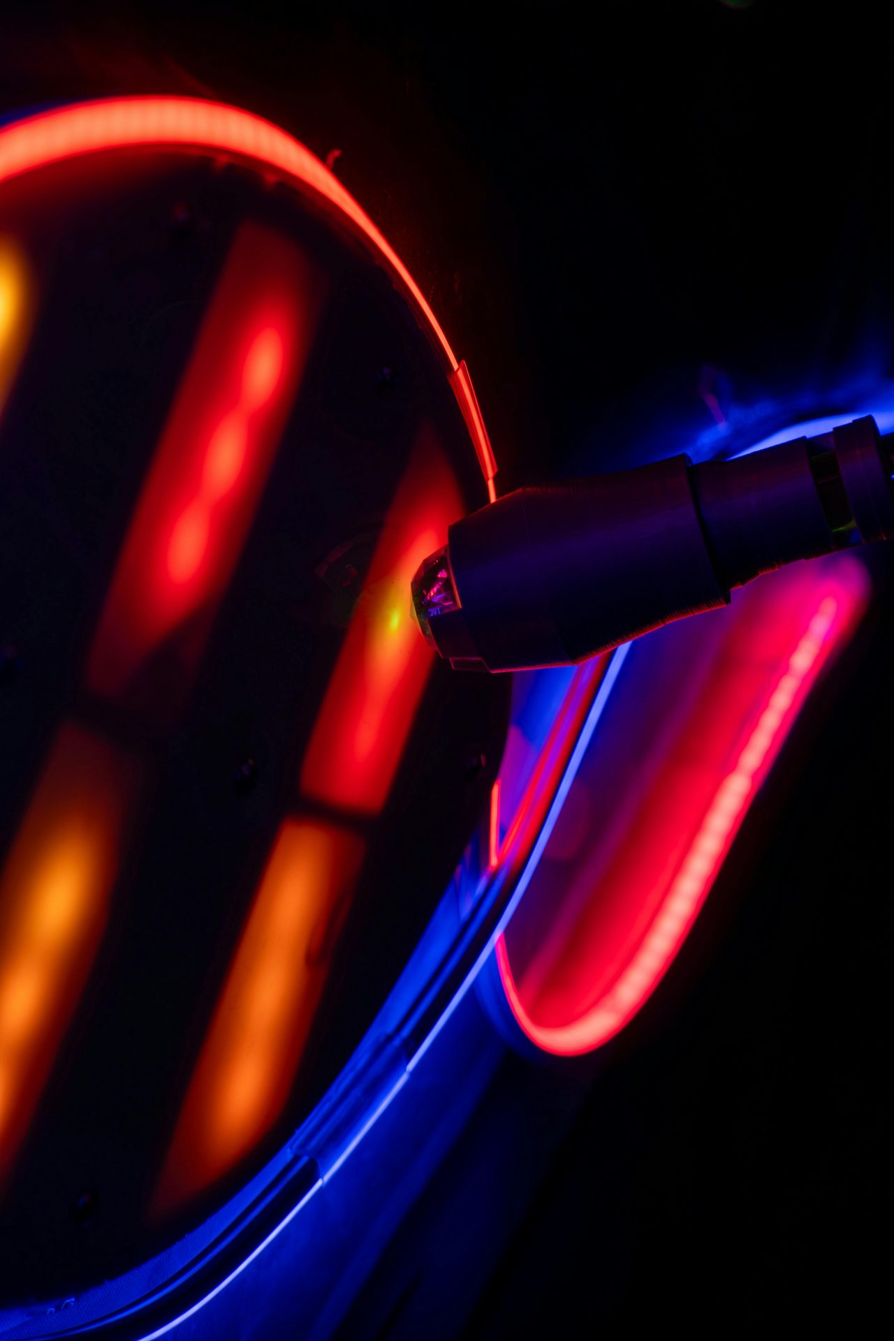 Close-up of high-tech scanner glowing red and blue inside Sydney’s Project Delta escape room