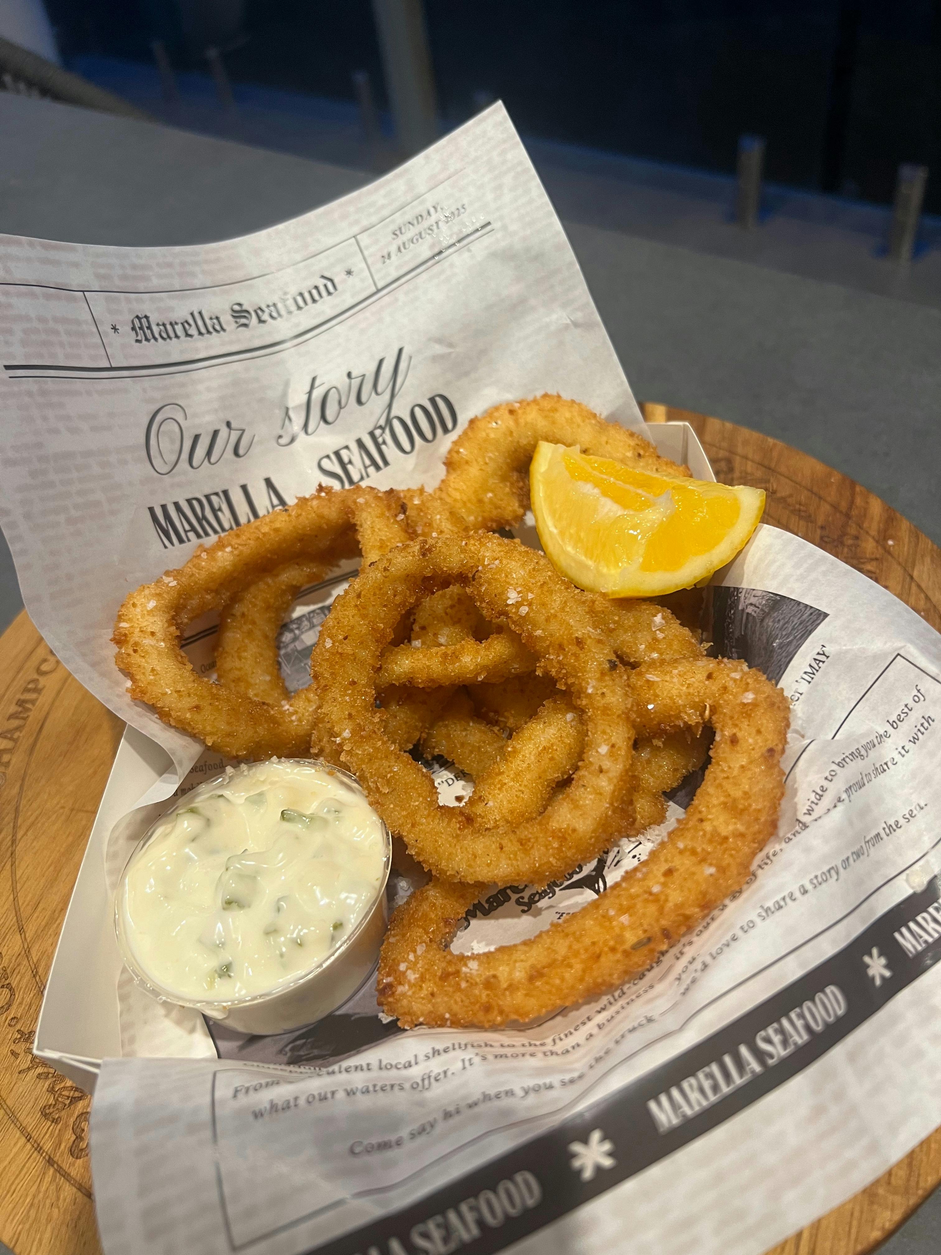 Crumbed calamari & chips served with homemade tartare sauce and lemon