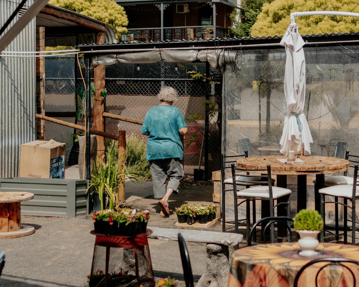 Woman walking around cafe