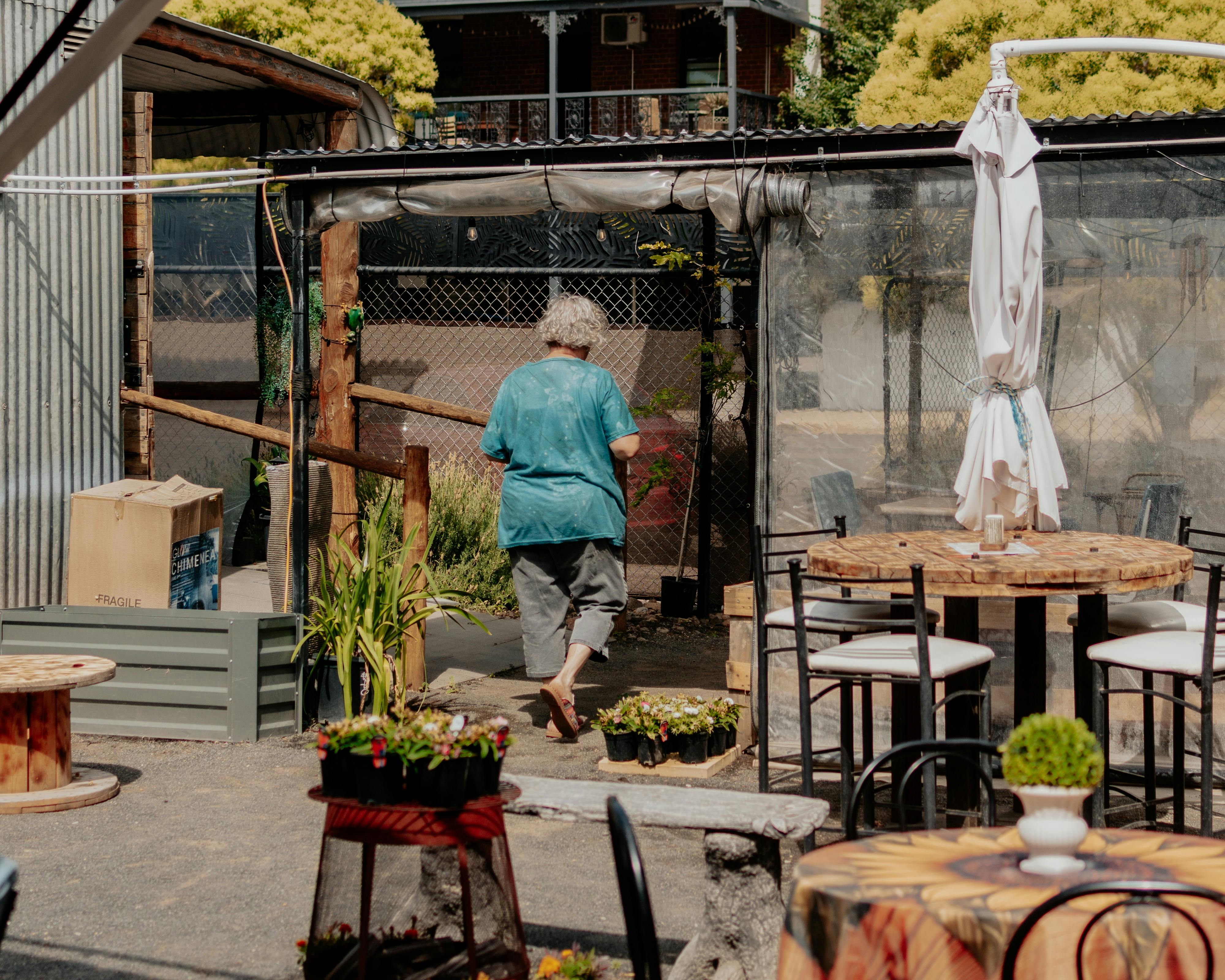 Woman walking around cafe