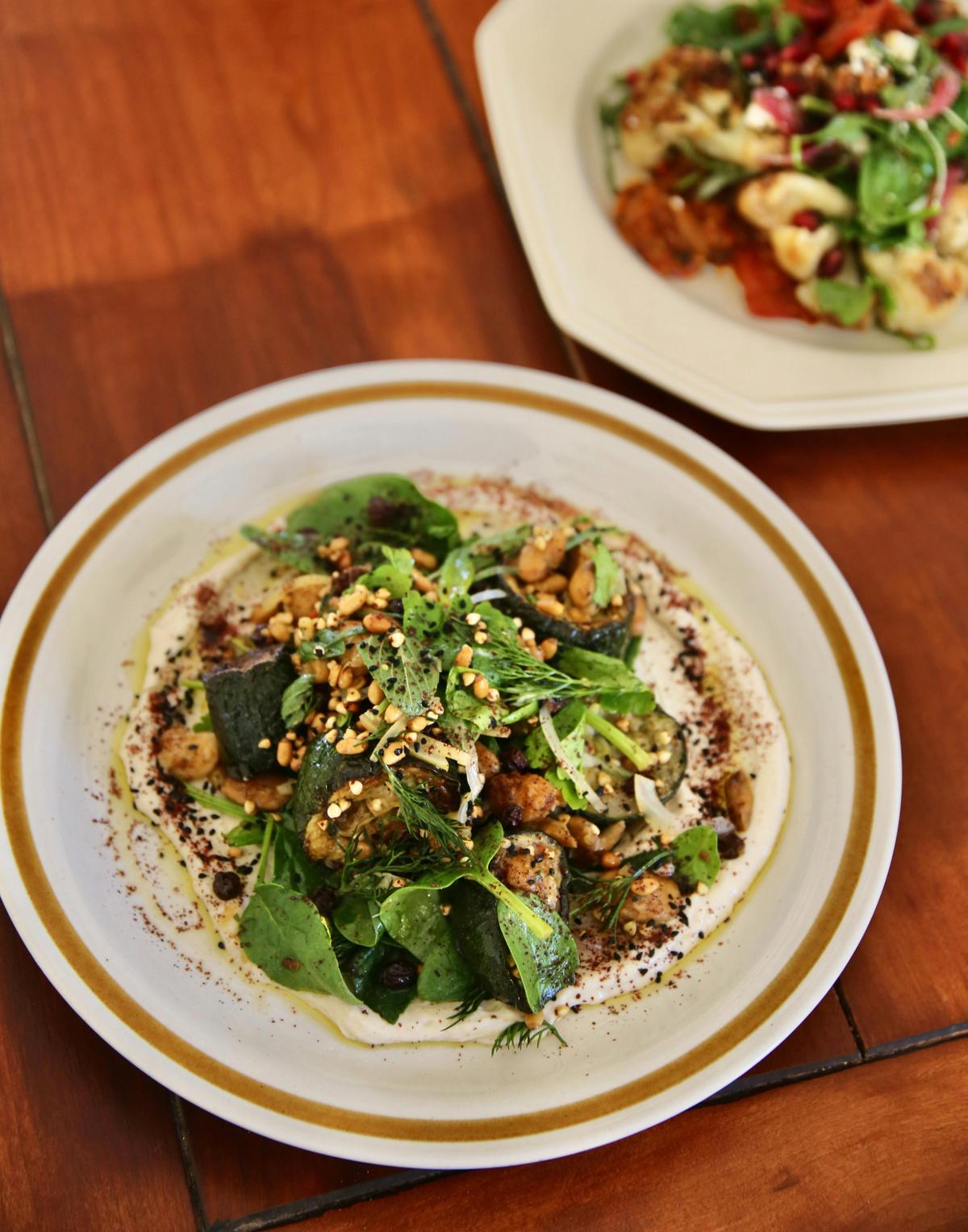 Zucchini salad, roast garlic tahini, currants, buckwheat, preserved lemon