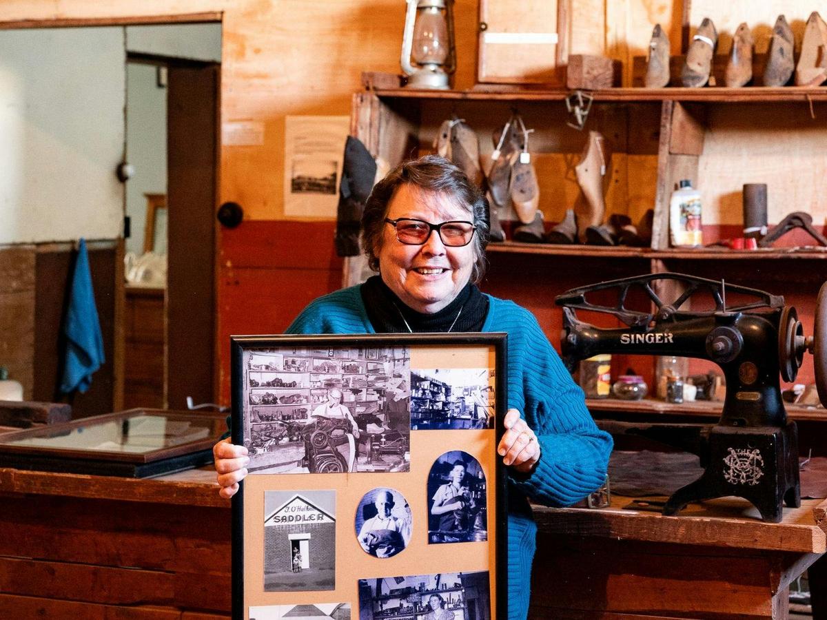 Museum curator in the original work space at O'Halloran Cottage Yeoval
