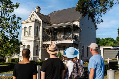 People looking at Bronte House at St Marys