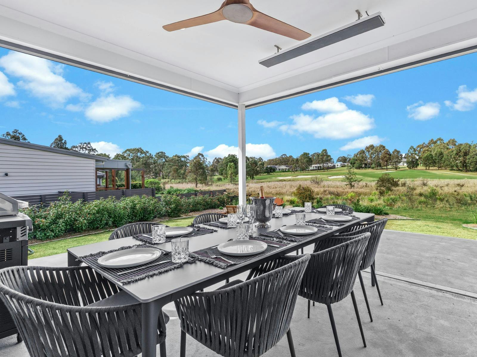 21 Forever outdoor entertainment area including dining area