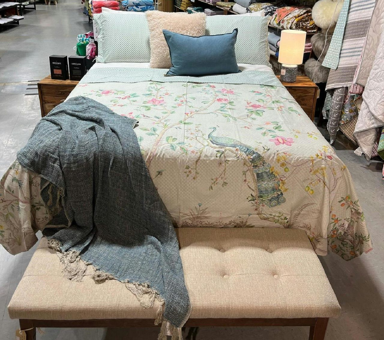 Beautiful linen displayed on a bed in the showroom