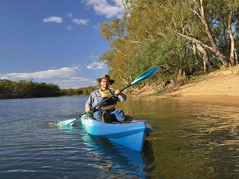 Man kayaking near Benarca campground in Murray Valley Regional Park. Photo: Gavin Hansford/NSW