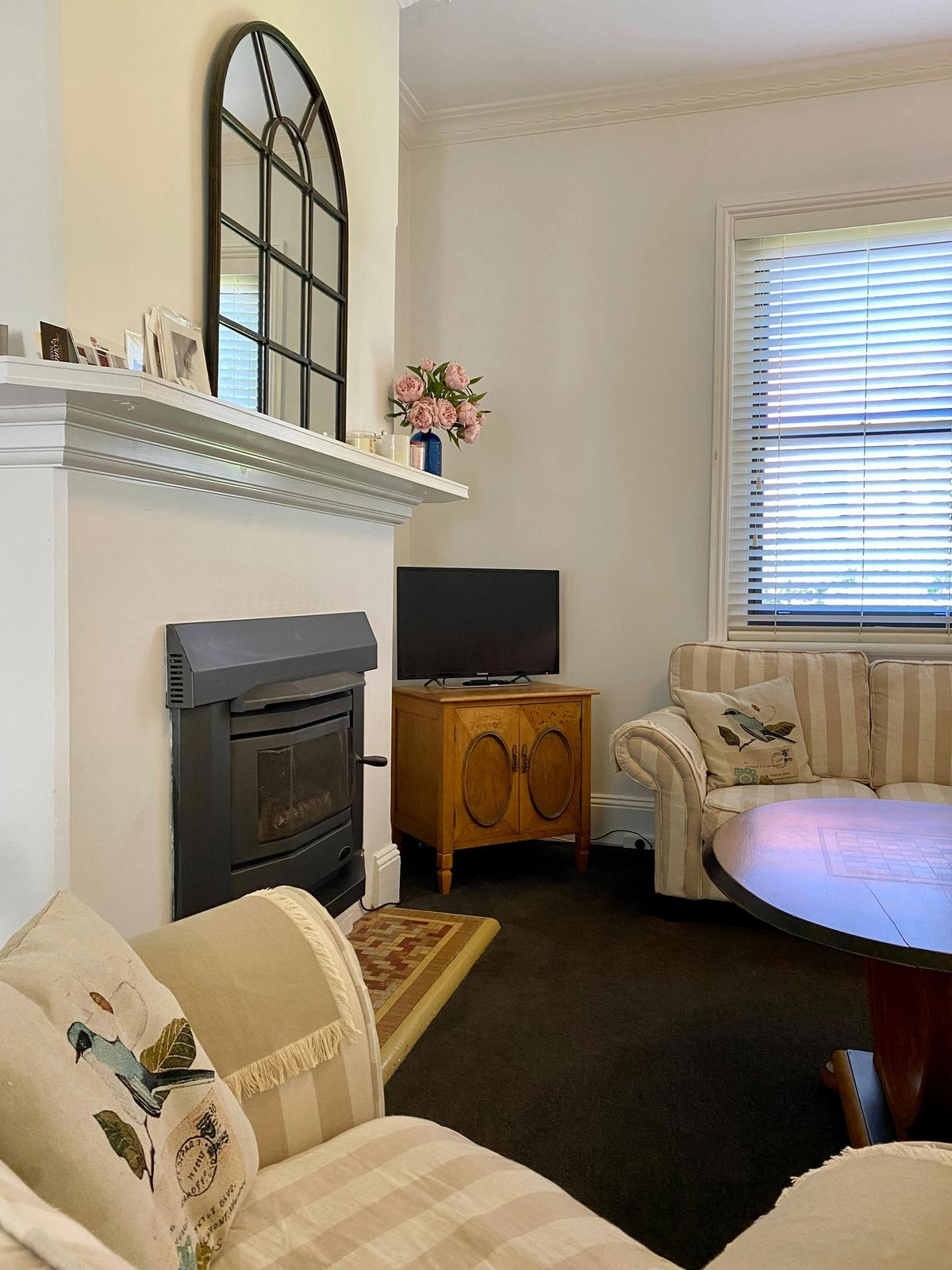 Cottage Loungeroom with log fire