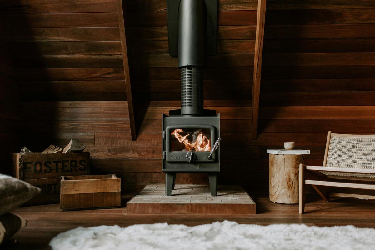 Relax by the wood fire at Aframe Kangaroo Valley