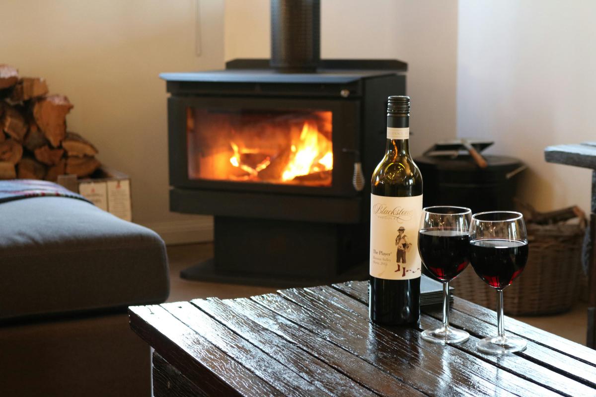 Enjoy a wine or two in front of a cosy fire