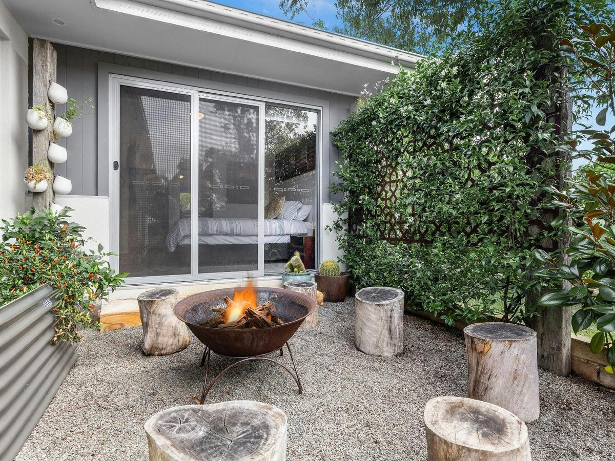 Alkira at The Vintage outdoor firepit and entertainment area