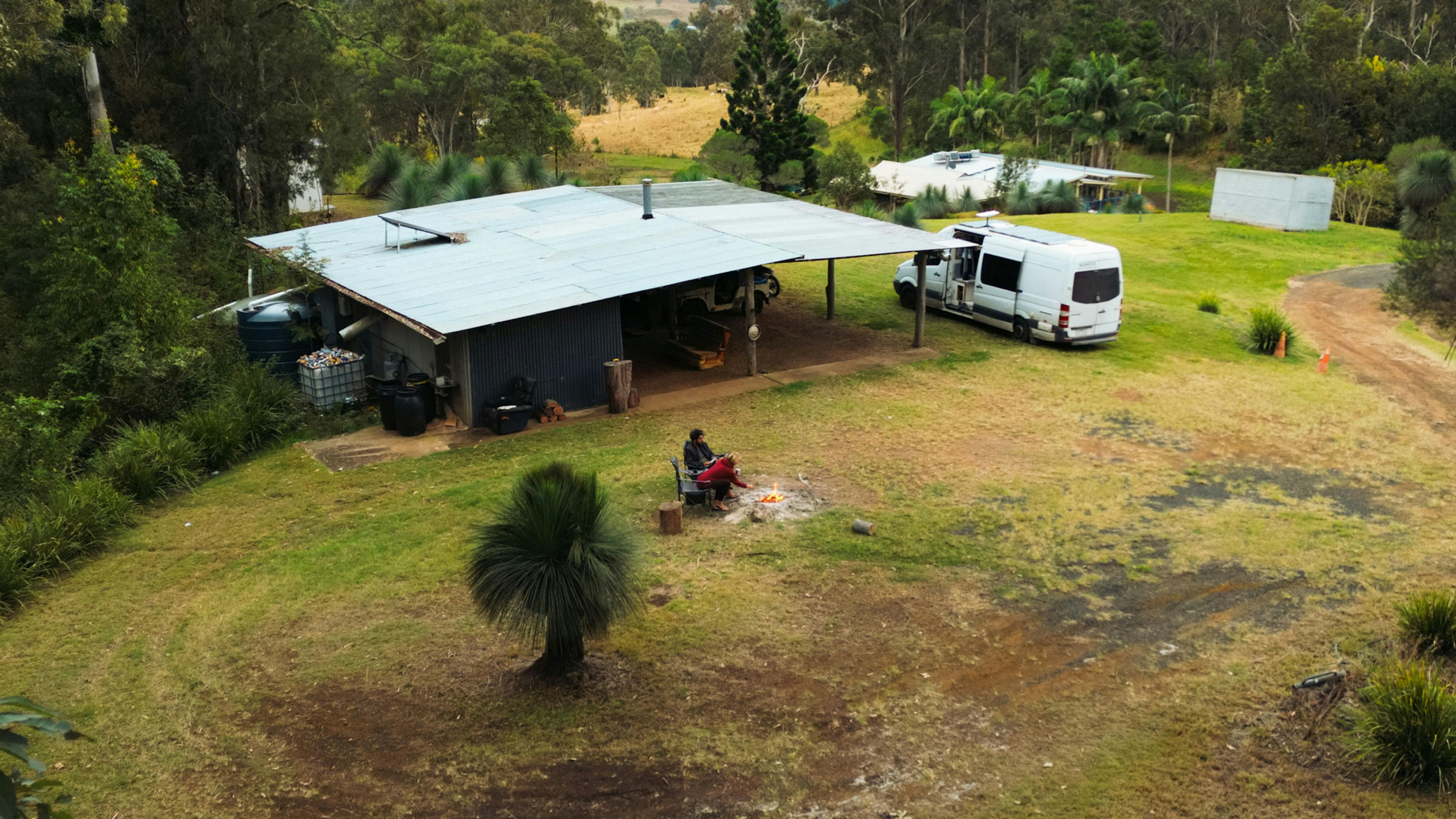 We parked our van next to the shack, close to the campfire.
