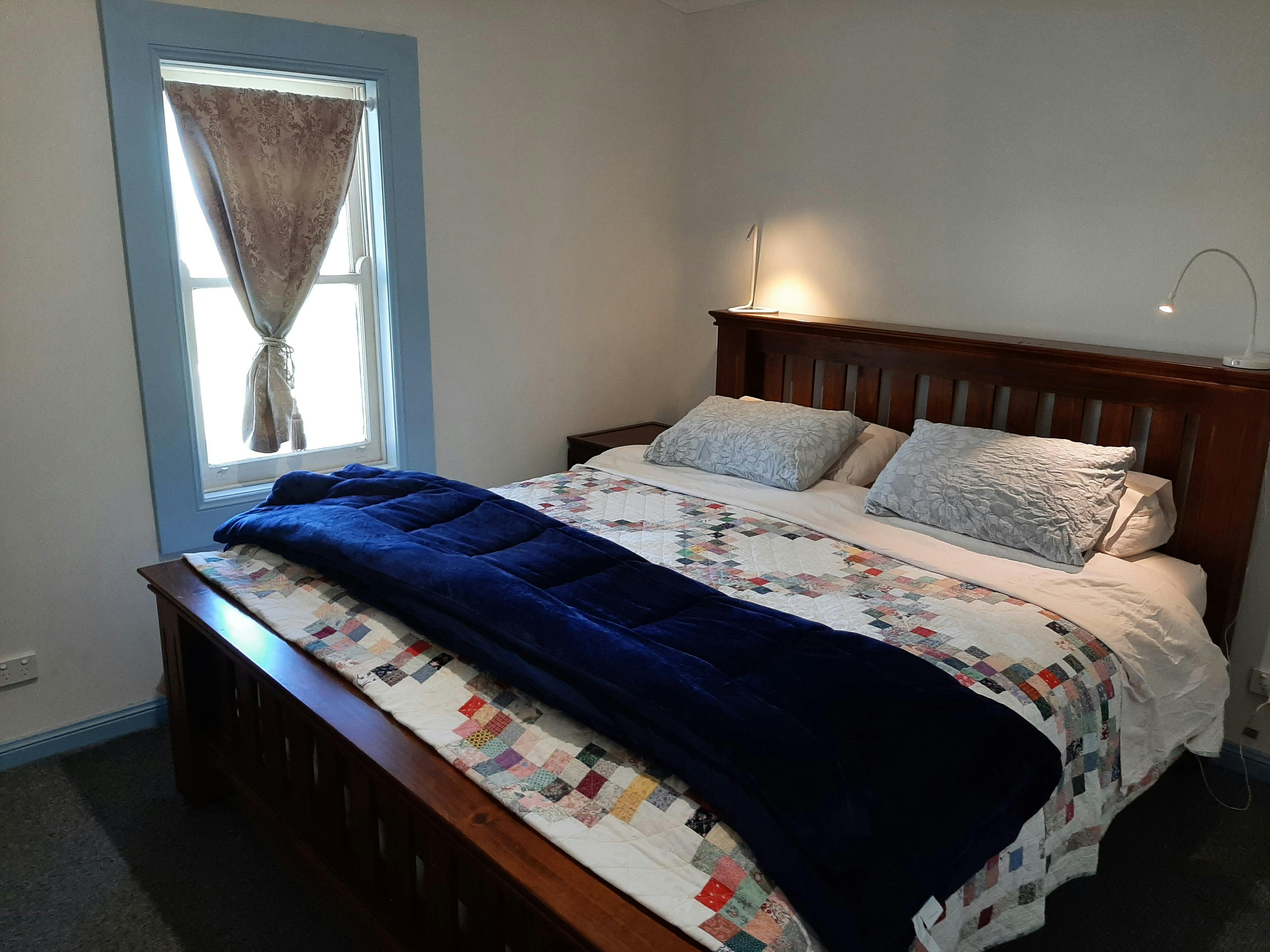 double bed, blue blanket