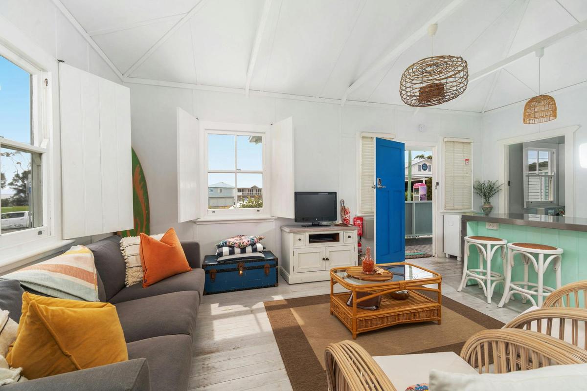Living room furnished in a fun beachy style