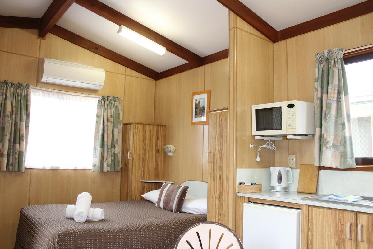 Our Ensuite Cabins are all open plan, with the double bed made up ready for your arrival