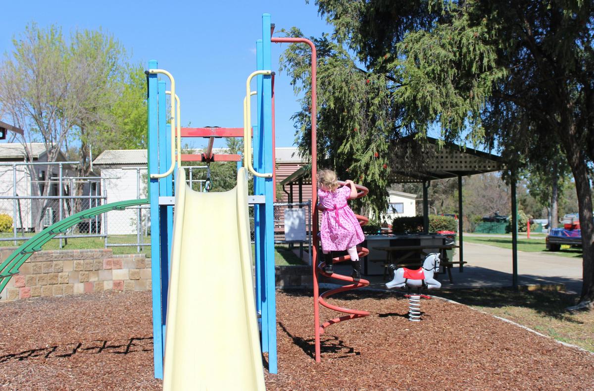 Plenty to keep the kids entertained - playground, swimming pool, and concrete roads!