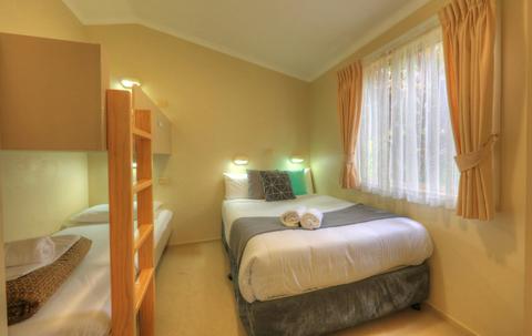 Deluxe Bushland Spa Suite bunkroom at BIG4 Koala Shores Holiday Park