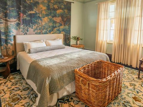 Cape Byron Assistant Lighthouse Keepers Cottages, Cottage 1, Queen bed. Credit: John Spencer/DCCEEW