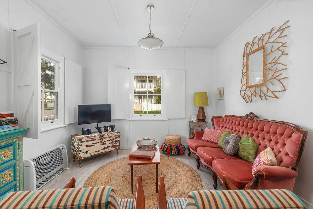 Living room with eclectic & colourful styling