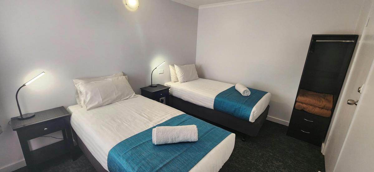 Second room with two single beds