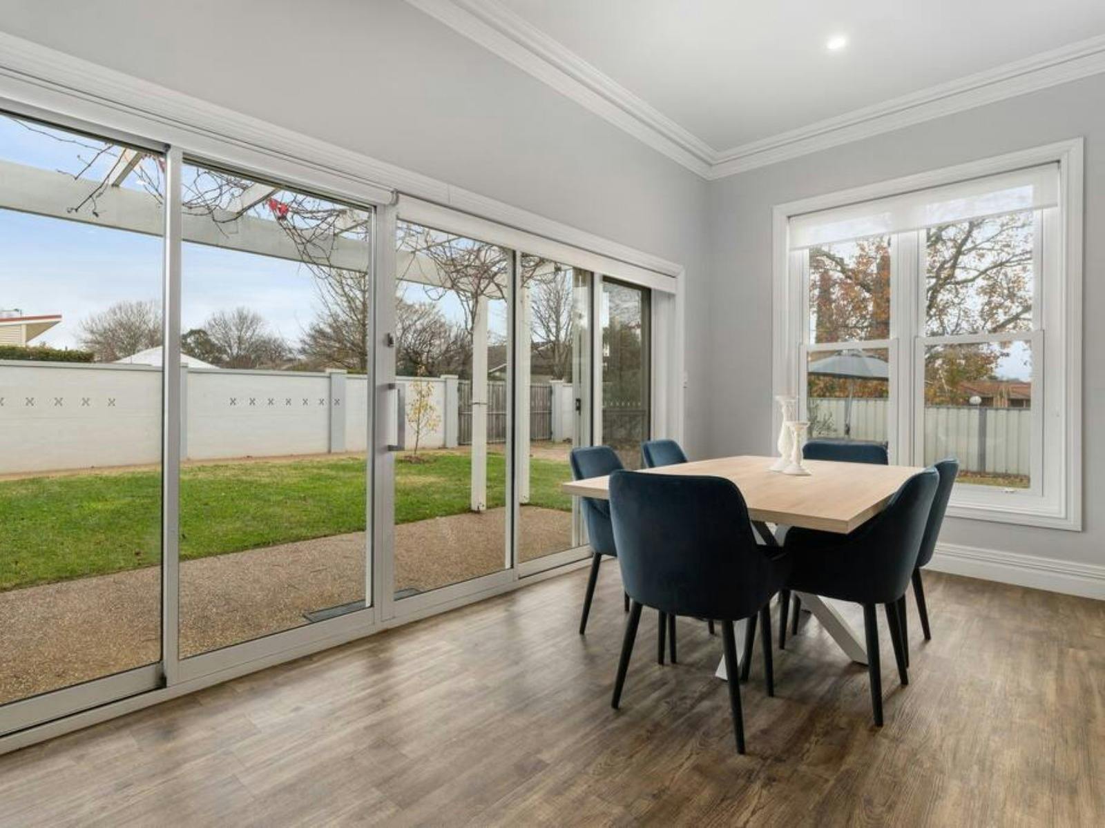 Dining room with backyard views at Barton House