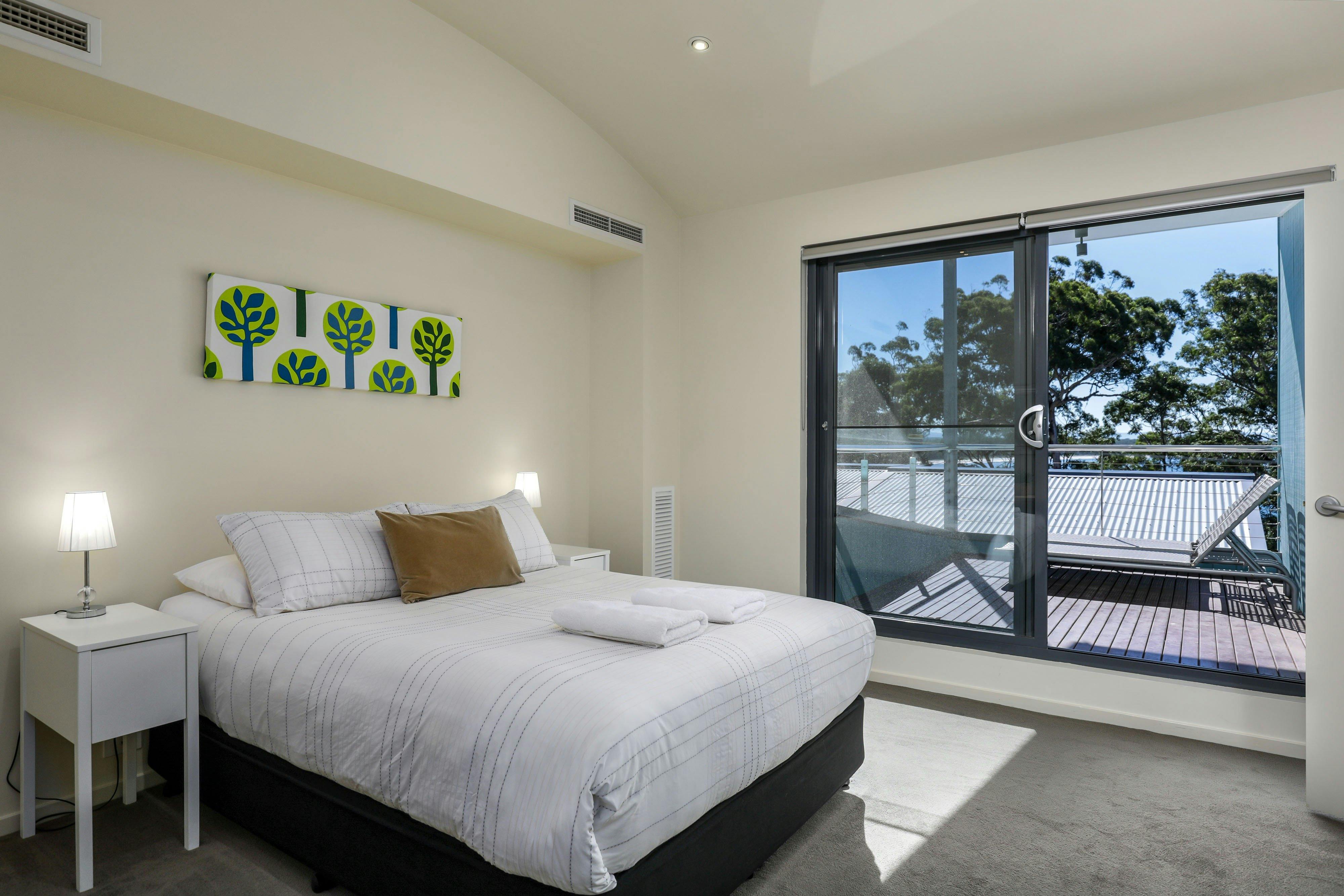 Master bedroom with ensuite and balcony