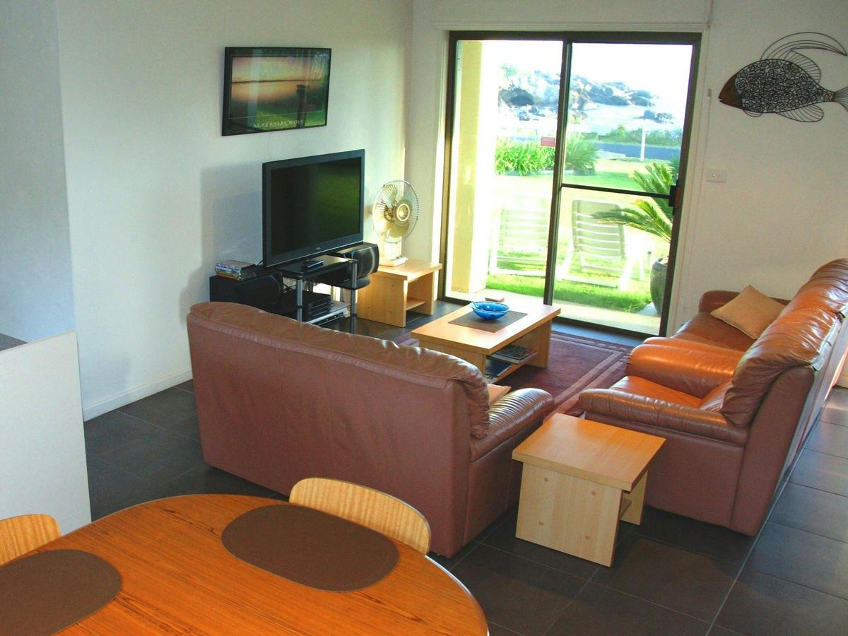 Lounge area with beach & seacave views