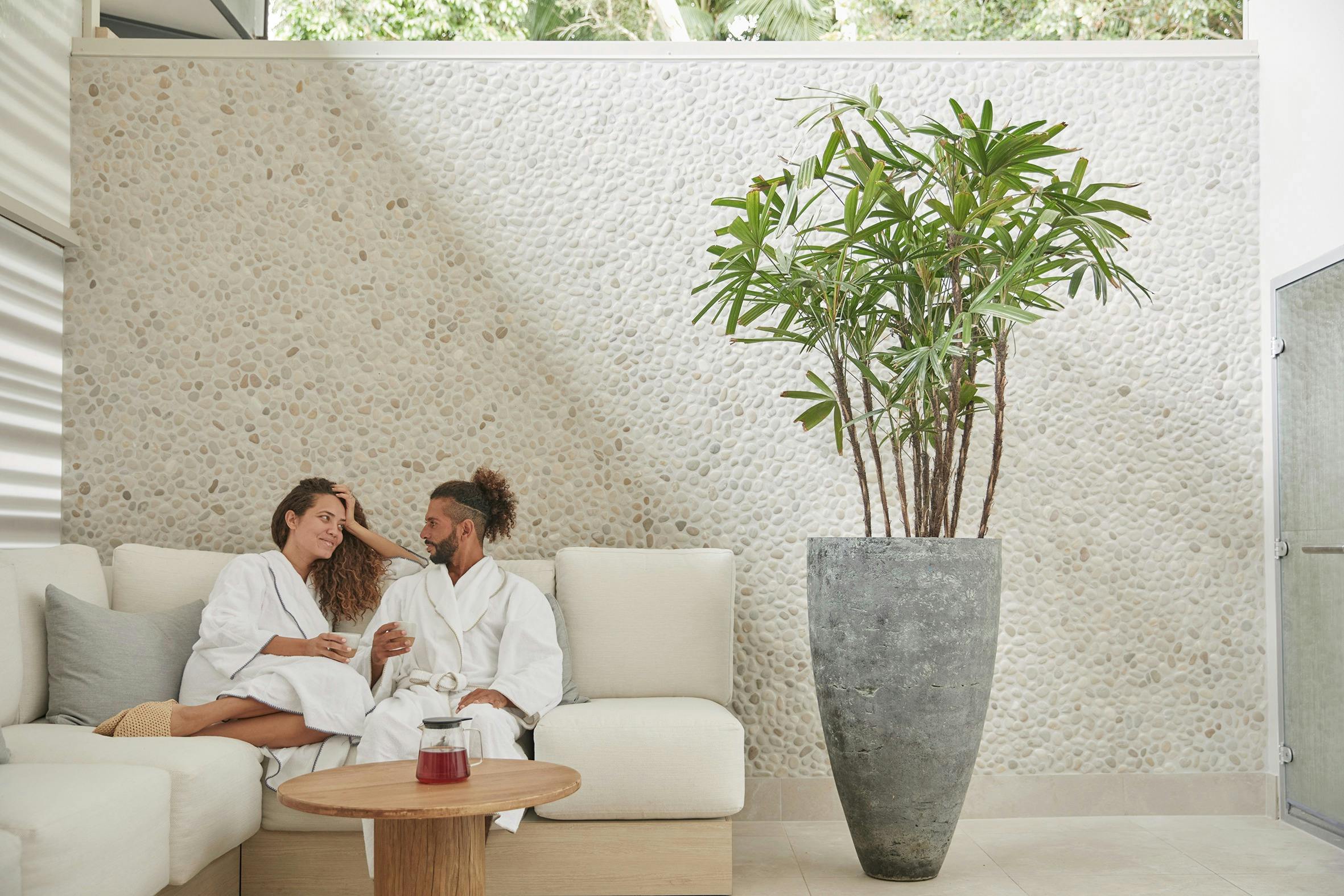 Eléme Day Spa outdoor relaxation area with couple