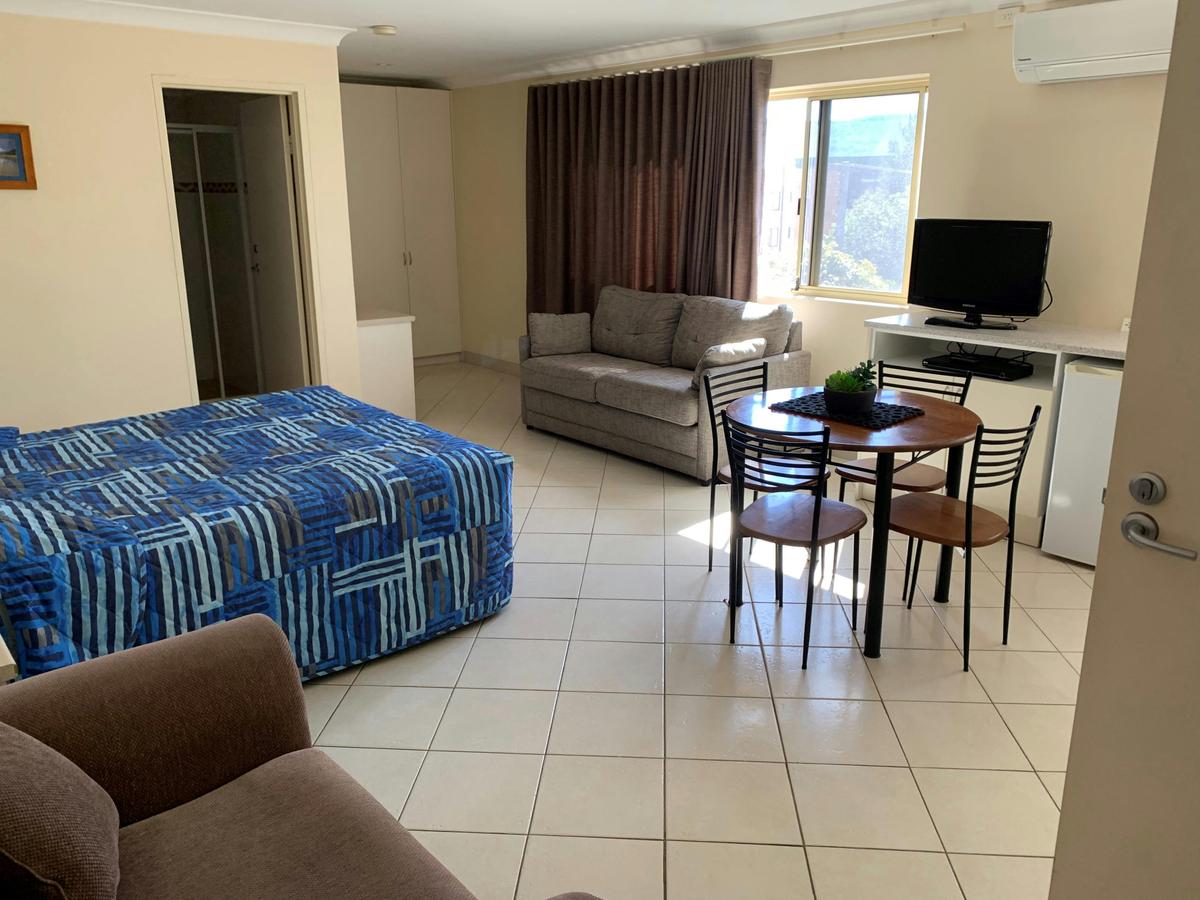 Studio apartment-bedroom living area