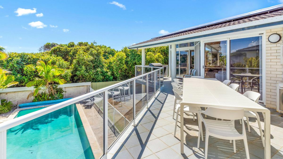 Outdoor dining overlooking pool