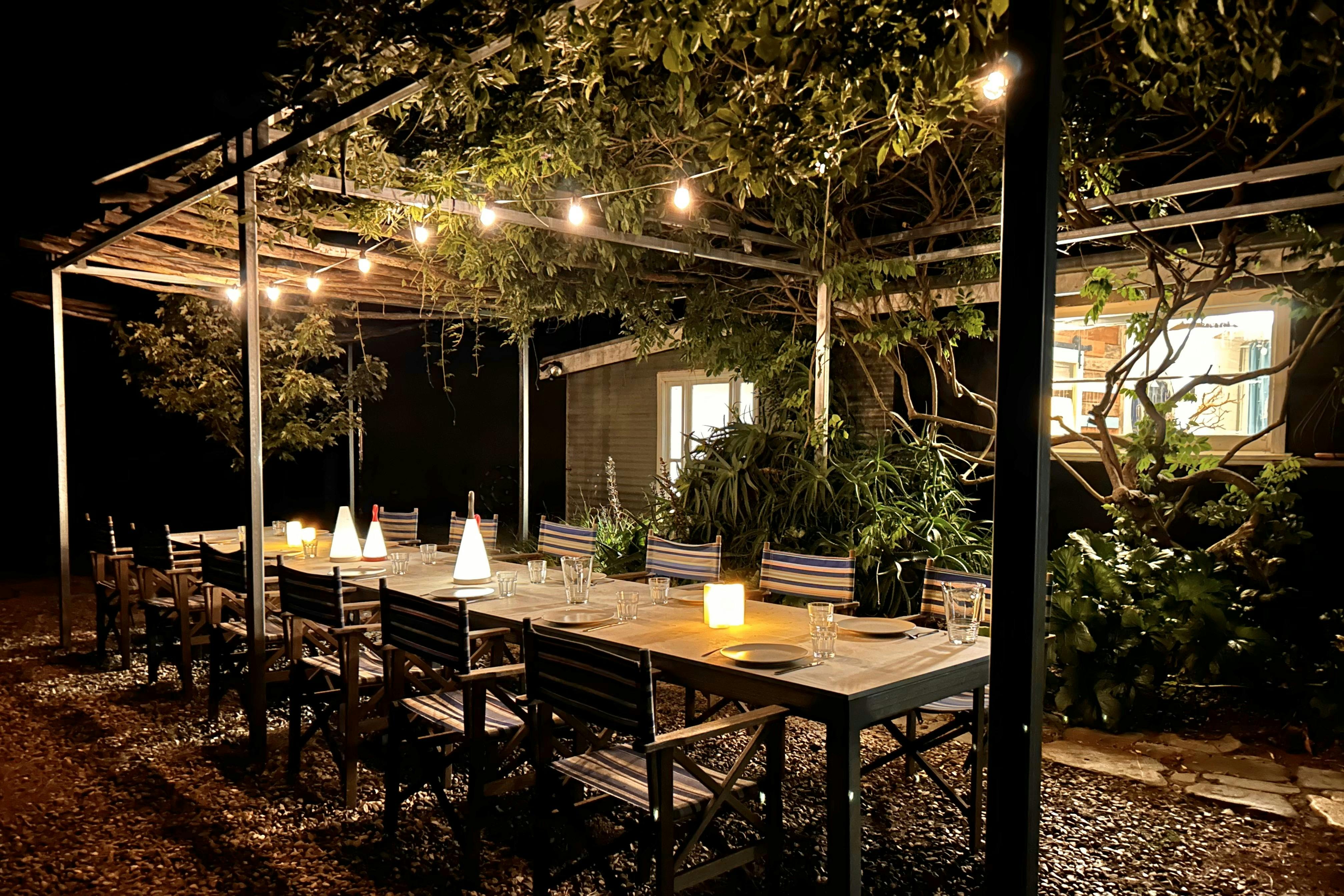 Farmhouse Outdoor Dining Terrace under Wisteria Pergola