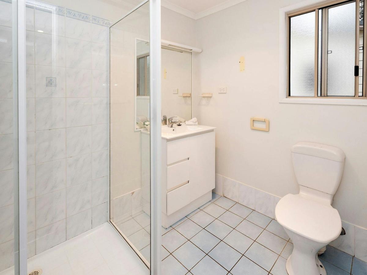 Bathroom with shower,  toilet and vanity
