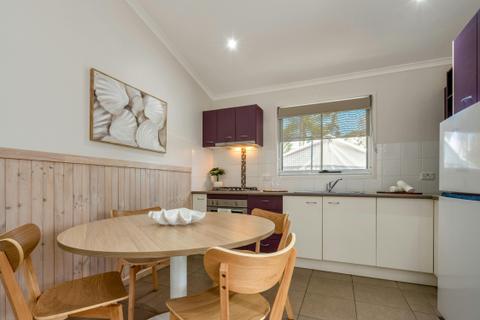 Superior Cabin (3BR) Kitchen | Tasman Holiday Parks - Ballina