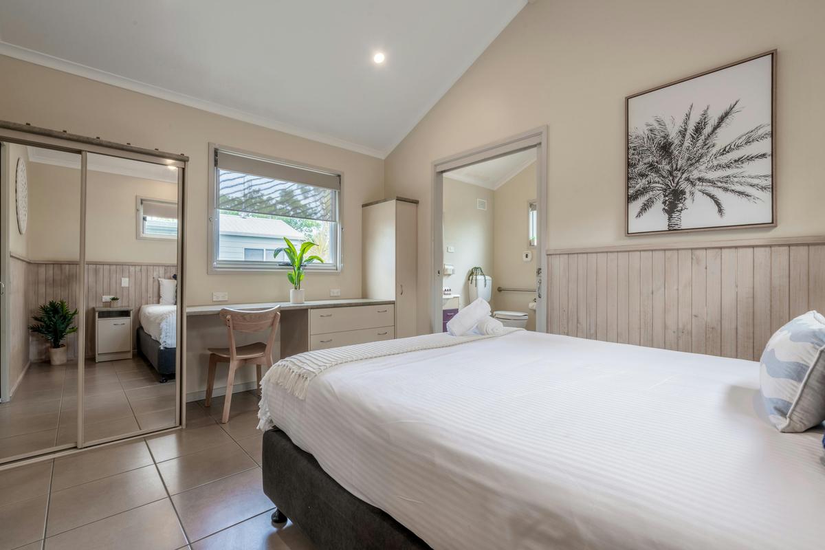 Deluxe Accessible Cabin Bedroom | Tasman Holiday Parks - Ballina