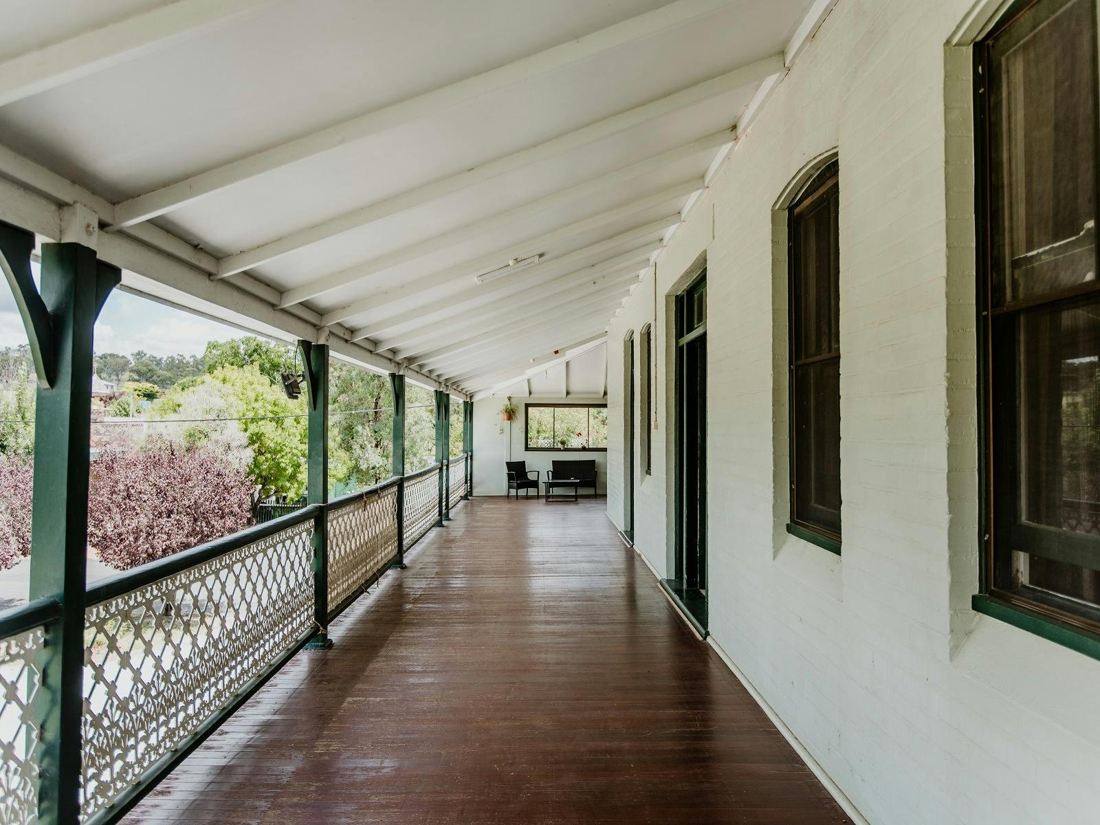 View of the top verandah above the pub including the doors to some of the hotel rooms