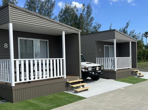 Modern Studios with 3 steps to verandah