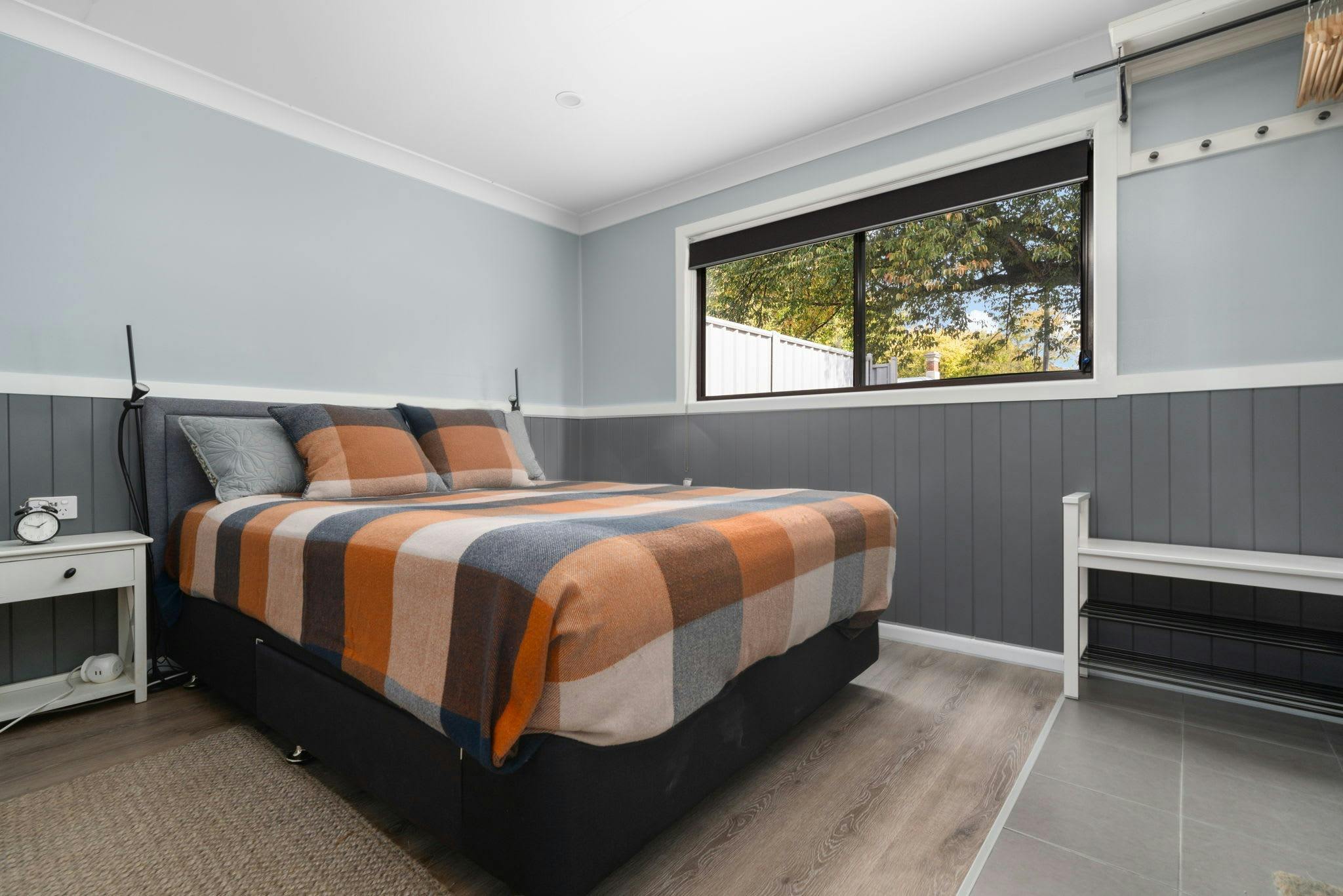 Queen bed at Bentick Studio