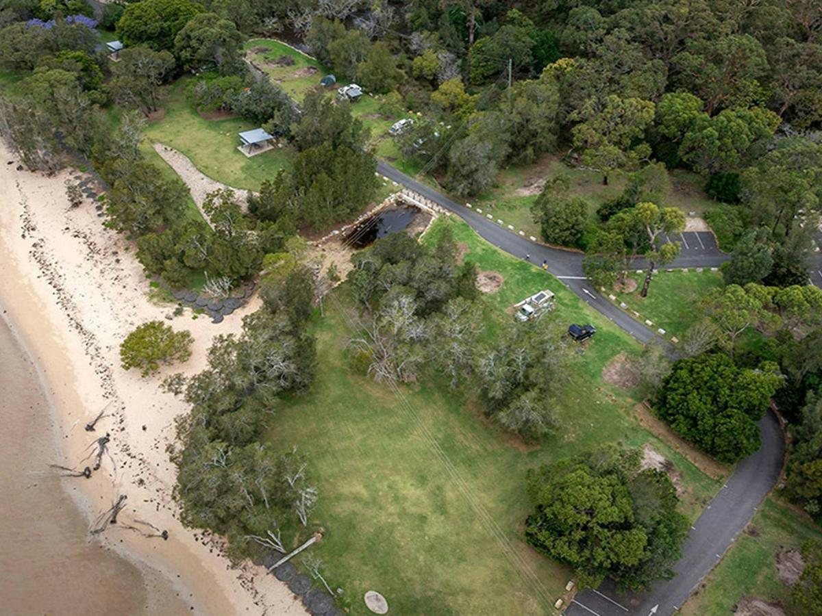 An aerial view of Bonnie Vale campground and parking in Royal National Park. Credit: John