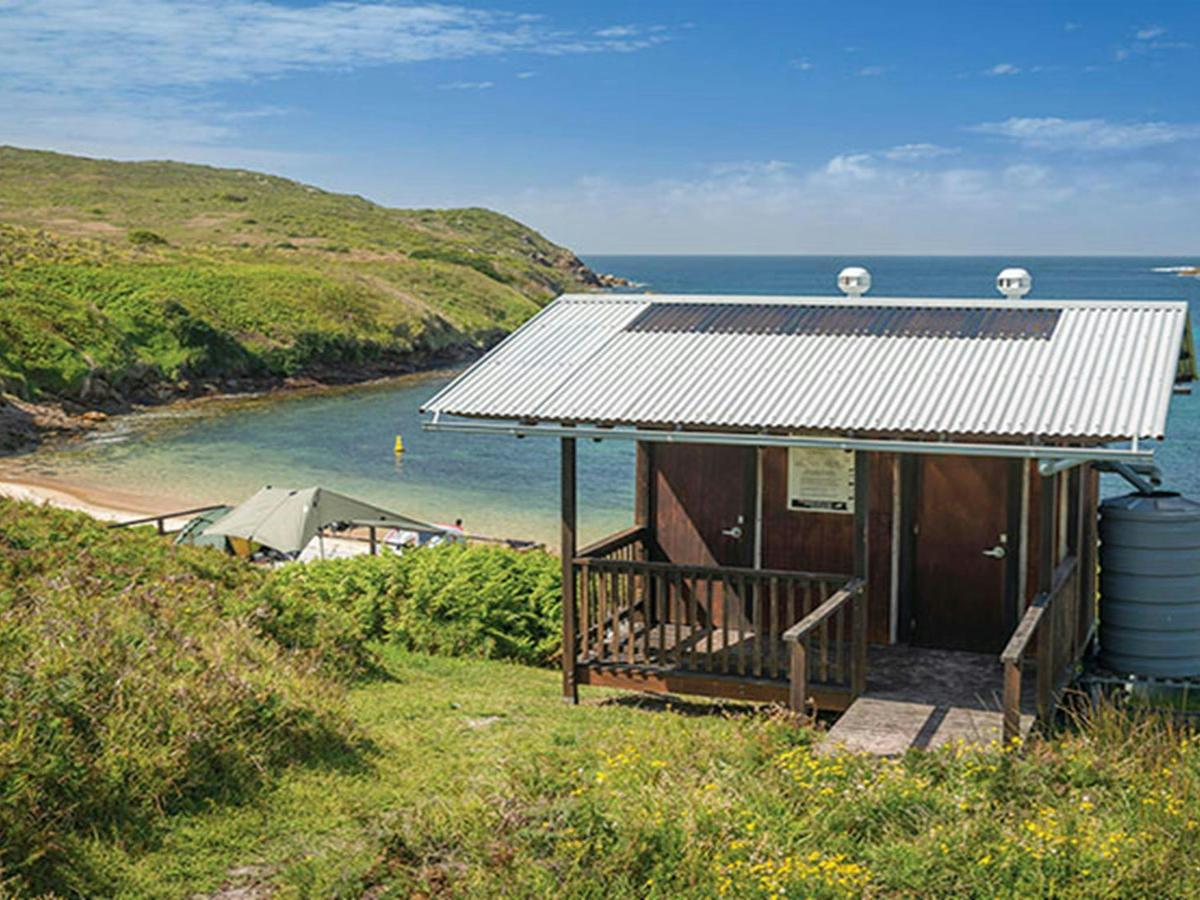 Toilet block containing non-flush toilets, Broughton Island campground, Myall Lakes National Park.