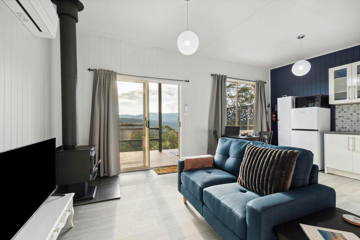 Lounge area with Smart TV and combustion fire
