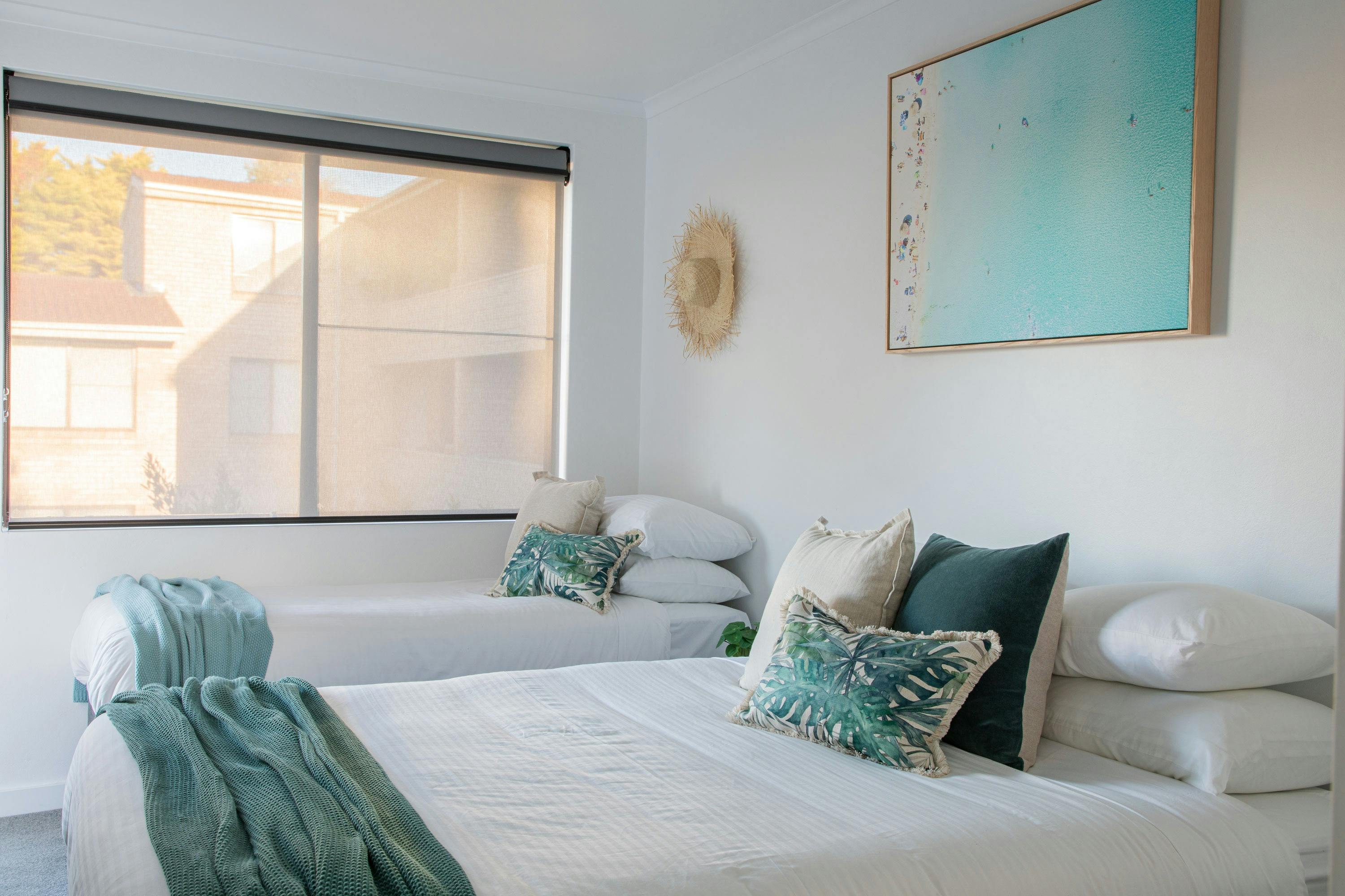 Sleep well in the second bedroom with queen bed, single bed and trundle