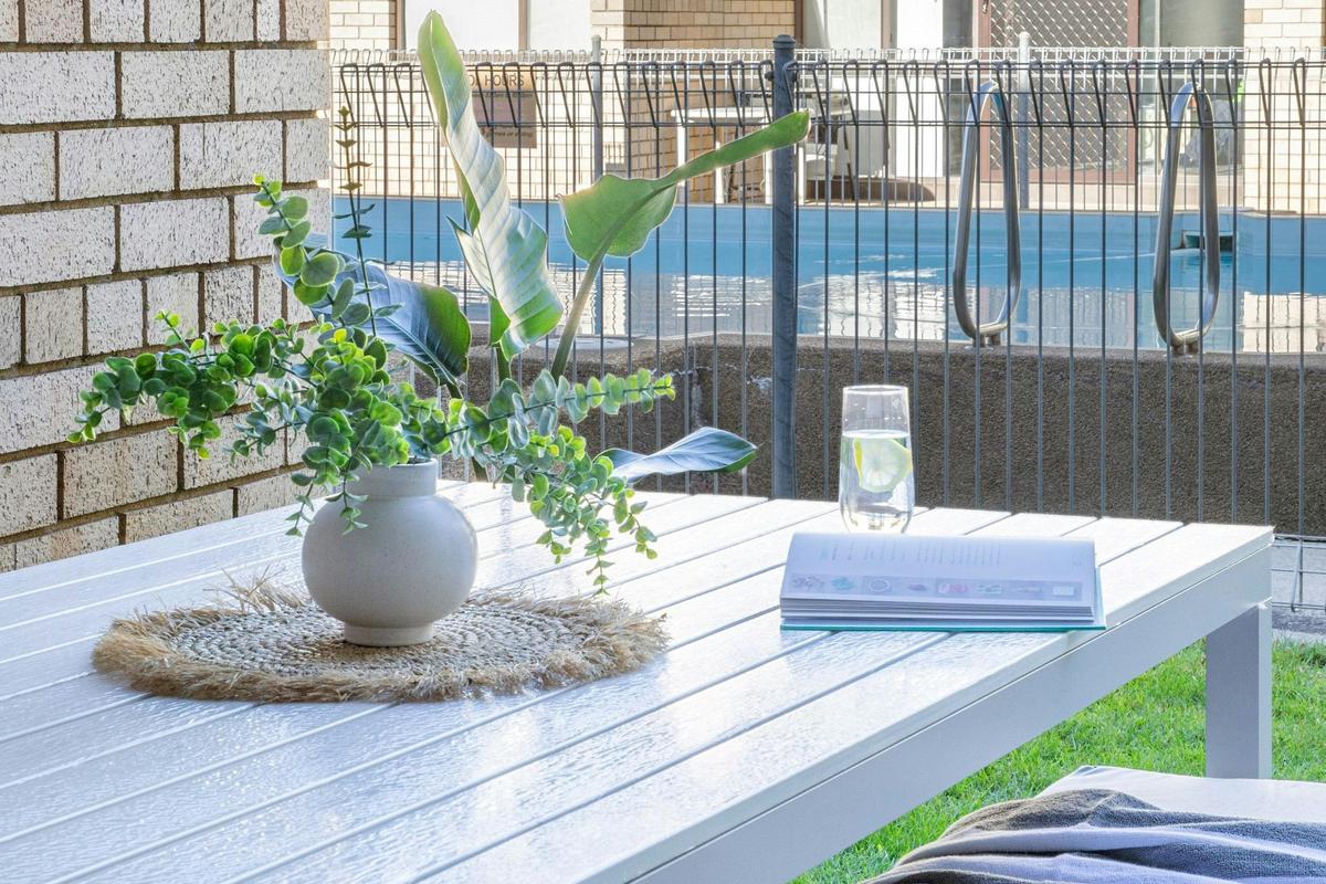 Relax by the pool in our al fresco area