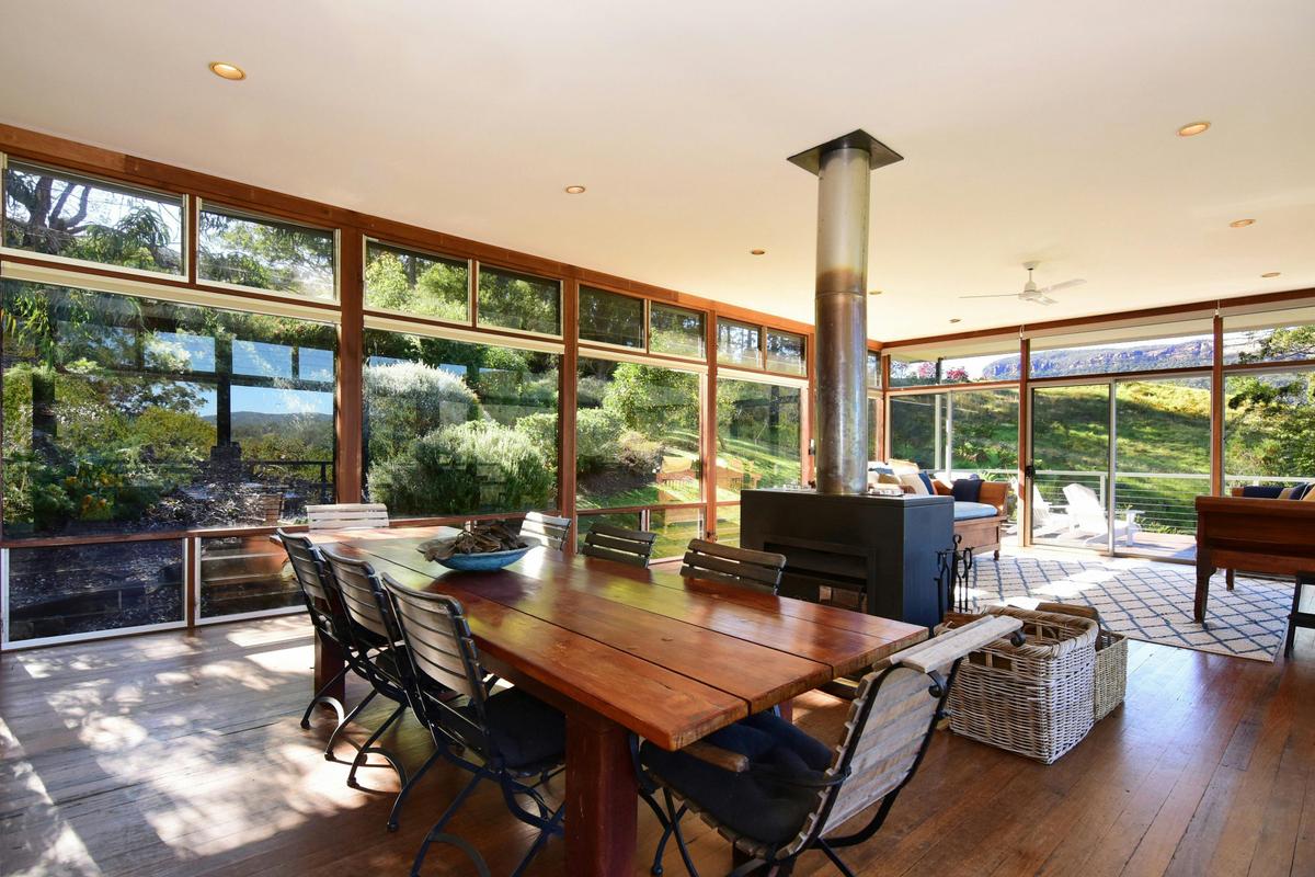 Dining area with double sided combustion fireplace