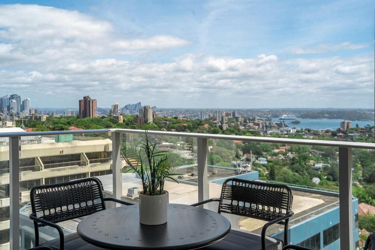 Enjoy stunning city views from this balcony seating area.