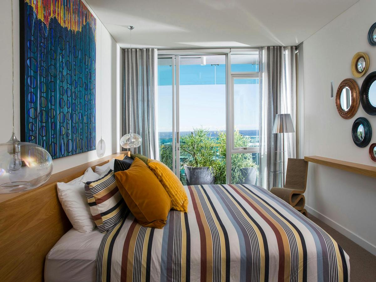 Colorful bedroom opened to the balcony