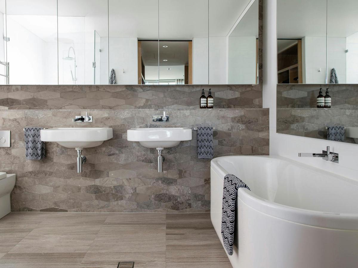 Luxurious bathroom with bathtub and shower