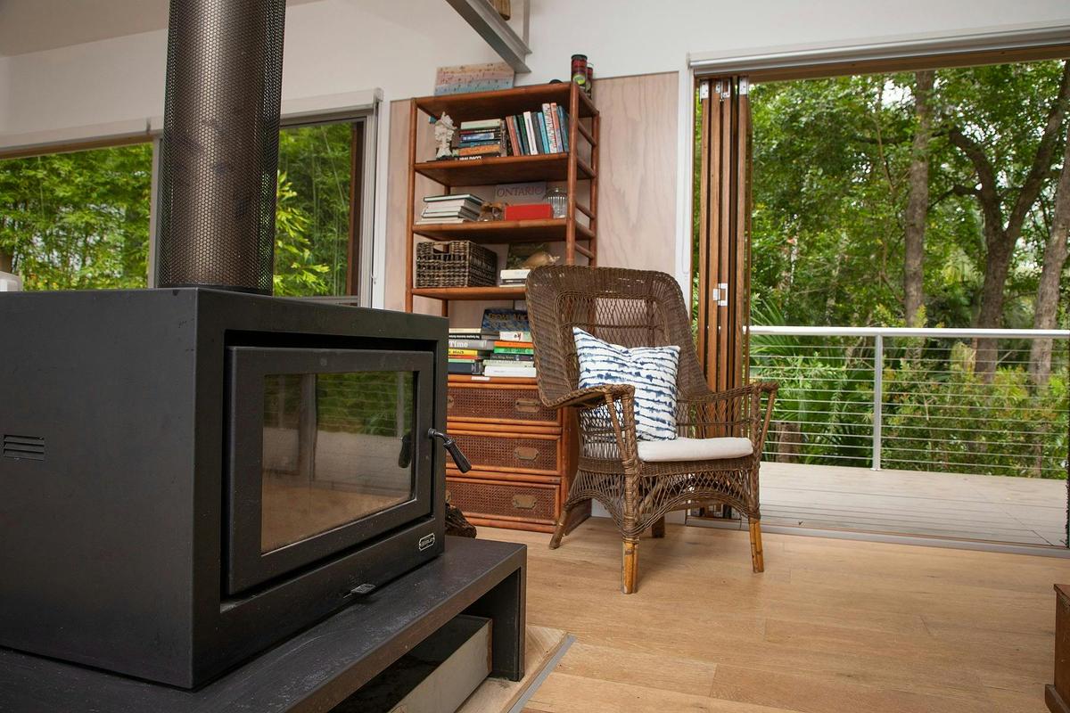 Open plan living room with fire.