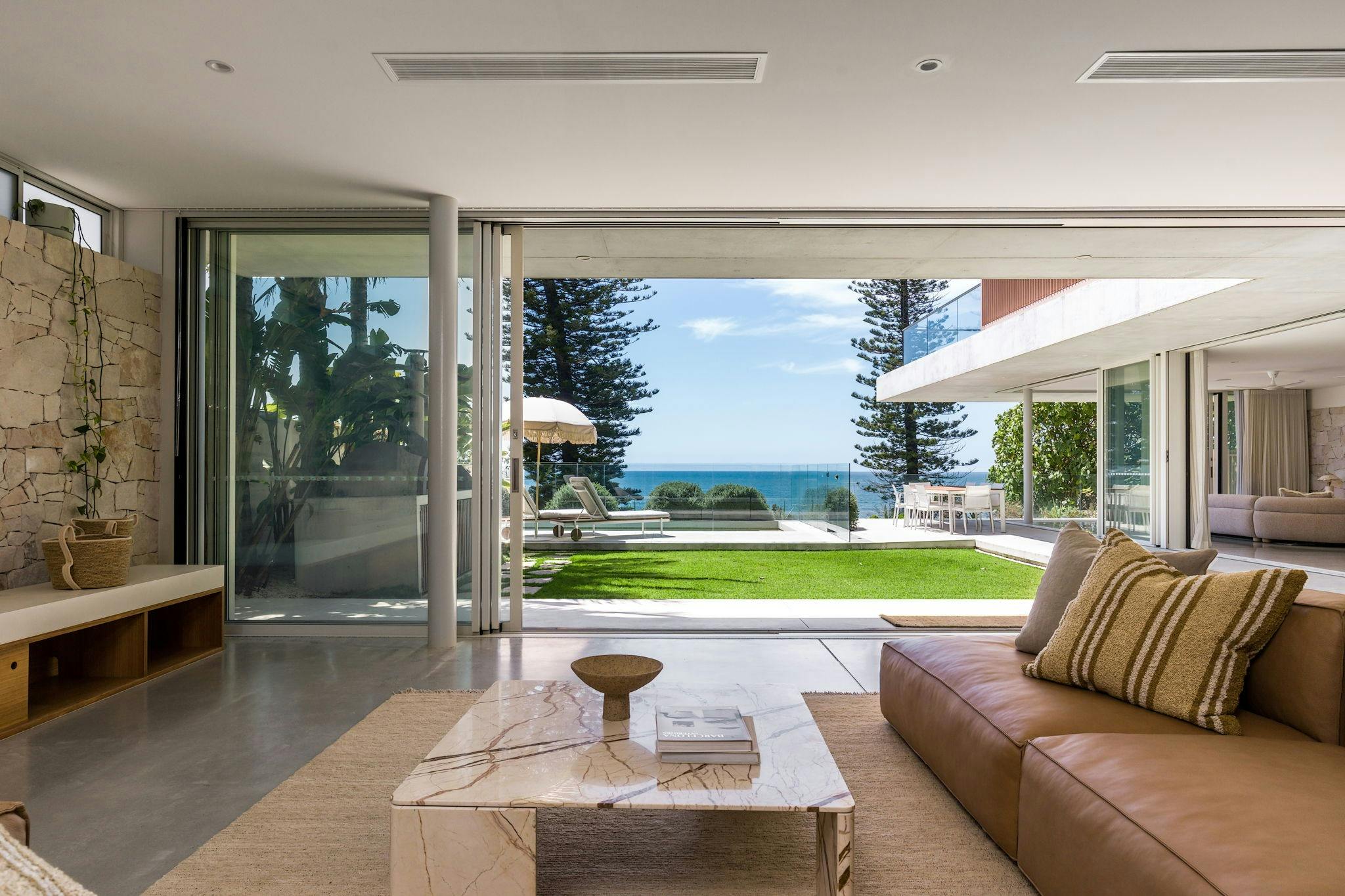 Seamless flow into open-plan living areas with ample light, creating a serene, inviting ambiance